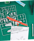 Plastic Model Airplane Propellers Replacement Parts Set For DIY Aircraft And RC Helicopters on green cutting mat