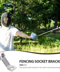 Fencer outdoors with metal fencing foil, shown with fencing socket bracket, multipurpose gear organizer for martial arts equipment.