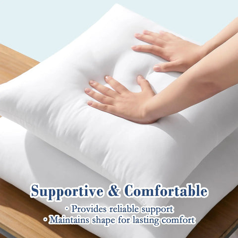 Hands pressing on 20x20 Outdoor Pillow Inserts Set Of 2 With Waterproof Fabric Down Alternative Cushions, showing plush support