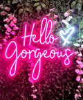 Hello Gorgeous Pink LED Neon Sign For Wall Decor, 21 Inch Neon Light with flowering backdrop.