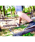 Person balancing on ropes, using 1/8 Inch 50 Ft Galvanized Steel Wire Rope Kit 7x19 Aircraft Cable With 400 Lb Safe Working Load.