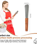 Woman holding stainless steel ice cream shovel with wooden handle, shown with measurements and ice cream scoop illustration.