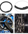 Two Pack Bike Flywheel Cassette Spacer 1.8mm Flywheel Gasket For Eight Nine Ten Eleven Speed Mountain Bikes Easy Install Tight Fit Reduces Shake 40.5 By 34.7 mm Black shown in detail with installation view on bicycle flywheel.