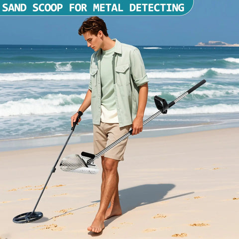 Man using sand scoop for metal detecting and treasure hunting stainless steel shovel with adjustable length on beach