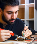 DIYer using 120W Digital Soldering Iron For DIYers With LED Display, Quick Heat Ceramic Heater From 356F To 932F for electronics repair