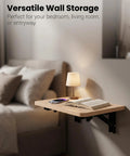 Slick Folding Wall Mounted Projector Shelf In Solid Natural Wood, Compact Floating Bracket For Routers And Cable Boxes, Dead Simple Setup For Any Cozy Home Theater Or Gaming Nook with soft lamp and open book.