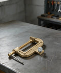 Top Tier 1000 Amp Brass Welding Earth Clamp With C Type Screw Design for Heavy Duty Shipyard Jobs And Steel Structure Projects That Won't Overheat Or Fail On Intense Work Days on a workbench.