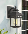 Outdoor Wall Light Lanterns, Black Cast Aluminum Exterior Fixtures With Seeded Glass on a porch wall