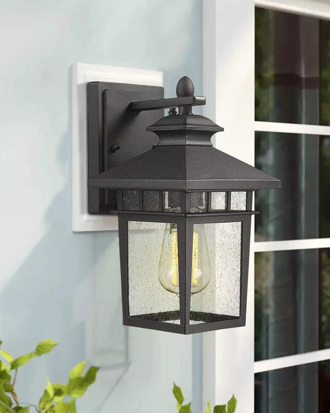 Outdoor Wall Light Lanterns, Black Cast Aluminum Exterior Fixtures With Seeded Glass on a porch wall