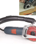 Angle Grinder Dust Collection And Extraction Attachment Pro Grade With Dust Shroud For Four And A Half Inch To Five Inch Grinders Dt1706 Quick Depth Adjustments Toolless Install Reduces Mess And Improves Safety For Safer Air And Cleaner Work Area shown on a grinder with vacuum hose.