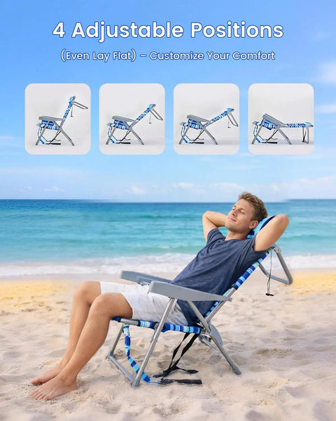 Person relaxing on Two-Pack Backpack Beach Chairs With Cup Holder And Towel Bars in lay-flat position on the beach.