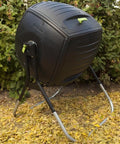 50 Gallon Compost Tumbler In Black No Fuss Easy Spin Barrel for Lawn Clippings and Kitchen Scraps, outdoor garden setup