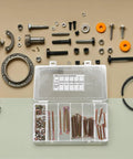 Open case displaying 49Pc M6 Hex Socket Head Screws And Barrel Nuts Set For Furniture Connectors on beige surface