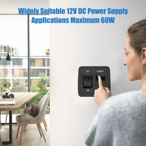 Badass 12V RV LED Dimmer Switch Large Black Slider used to adjust brightness on a wall, suitable for home and RV settings.
