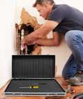 Open Rugged Aluminum Case With Foam Inserts Portable Hard Case Organizer For Tools And Gear next to worker fixing pipes