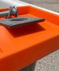 Close-up of orange Glove Friendly Utility Rack Tray With Raised Center For Small Parts Heavy Duty Polymer Bucket Organizer