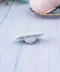 Close-up of a single white nylon 4 Pcs Self Adhesive 360 Degree Swivel Caster Wheel with durable ABS construction and steel ball bearings.