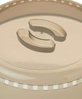 Close-up of 10.25 Inch Microwave Food Cover Gray With Steam Vents Center Grips For Splatter Free Cooking Nonstick Surface