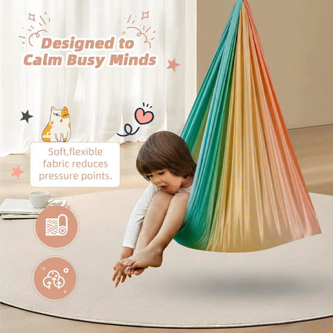 Child in a Heavy Duty Straight Up Smooth Sensory Swing For Kids And Adults Indoor Outdoor Cuddle Hammock Chair, relaxing.
