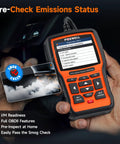 Person holding NT510 Elite Scan Tool For BMW Mini Rolls Royce Full Diagnostic Tool OBD2 Scanner showing emissions status menu