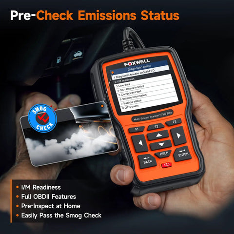 Person holding NT510 Elite Scan Tool For BMW Mini Rolls Royce Full Diagnostic Tool OBD2 Scanner showing emissions status menu