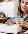 Person using Easy Threading Sewing Needle Threader With Quick Threading Mechanism Auto Needle Threader With Magnetic Storage