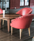 Kickass Black Upholstery Nails And Thumb Tacks Hella Durable Round Head Metal Finishing Hardware for reupholstering furniture, red chairs and wood table.