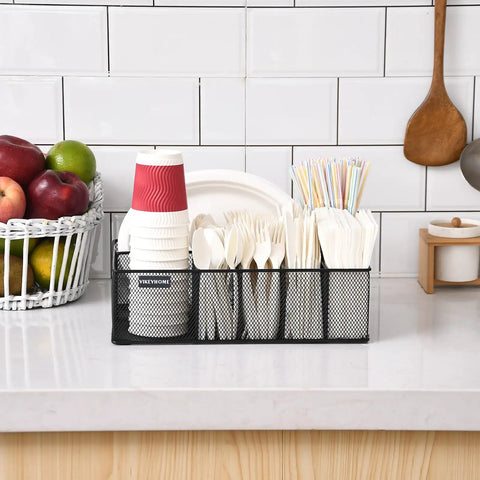 Countertop Paper Plate Organizer With 6 Compartments And Silverware Caddy, holding cups, utensils, and napkins on a kitchen counter.