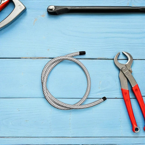 Universal Garment Steamer Hose Replacement Tube, 1 Meter, Black and White, shown on blue wooden background with tools.