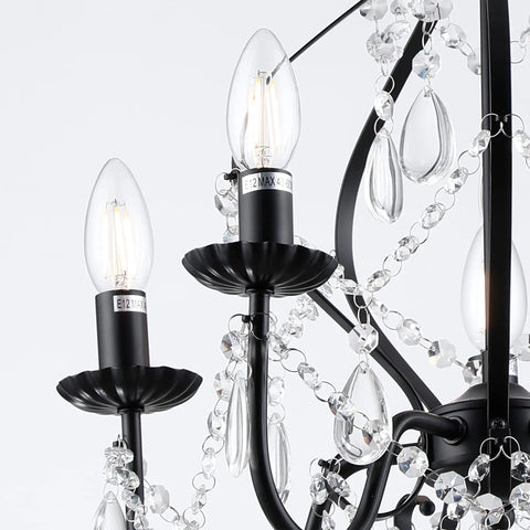 Black Crystal Chandelier With 5 Lights, K9 Crystal Raindrops, detail of black iron finish and light bulbs, modern glam design.