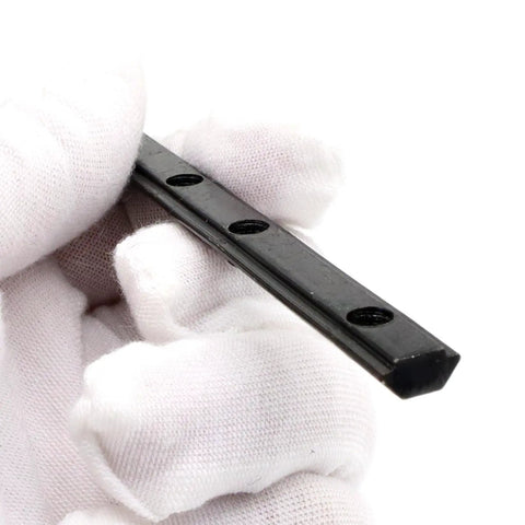 Close-up of Four Pack 20 Series Aluminum Extrusion T Slot Corner Brackets With Screws Straight Line Connectors in hand