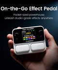 Hand holding Tiny Stomp Multi Effects Guitar Pedal With 125 Effects 99 Presets 10 Modules 40 Second Looper 100 Drum Rhythms