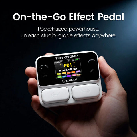 Hand holding Tiny Stomp Multi Effects Guitar Pedal With 125 Effects 99 Presets 10 Modules 40 Second Looper 100 Drum Rhythms
