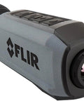 Scion OTM 9Hz Thermal Imaging Monocular With Onboard Video Recording And MicroSD Expansion, close-up of lens and grip design.