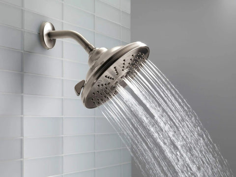3 Spray Touch-Clean Shower Head In Venetian Bronze Finish, High-Pressure Full-Body Sprays flowing in modern bathroom
