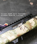 Extended Length Picatinny Rail Mount For Ruger 10/22 Rifles With Forward Extension installed on camo rifle