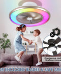 22 Inch Bladeless Low Profile Ceiling Fan With Lights And Remote Enclosed Flush Mount RGB 7 Color Mood Lighting And Built In Music Speaker for Bedroom Living Room Party Vibe, showcasing enclosed fan with glowing colors above children playing on sofa.