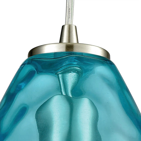 Close-up of Lagoon Mini Pendant Light With Dope Aqua Water Glass In Satin Nickel Finish, showing blue glass accent and steel fixture.