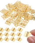 24 Pcs Dollhouse Hinges 10x8mm 180 Degree Stainless Steel Gold Tiny Hinges For Miniature Furniture And Jewelry Boxes With 96 Screws Included By SynHHnergyx displayed with hand holding one hinge.