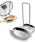 Heavy Duty Stainless Steel Pot Lid Holder And Integrated Spoon Rest Multipurpose Kitchen Utensil Caddy with a wooden spoon.