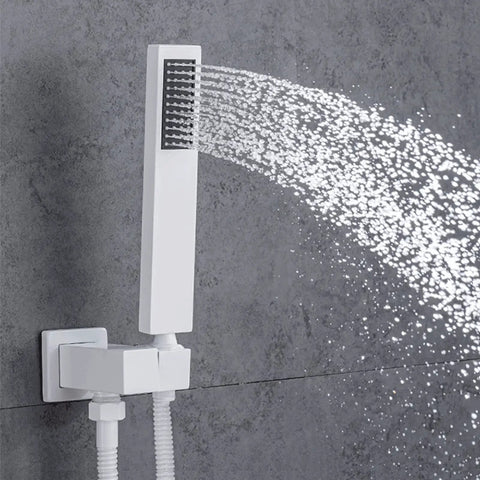 Digital Display Rainfall Shower Faucet Set With Real Time Temperature Reading Oversized Ceiling Rainhead Plus Ergonomic Handheld Wand modern handheld wand in white with water spray, mounted on a wall.