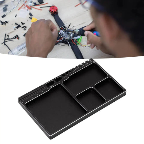 Magnetic RC Parts Tray Portable Aluminum Alloy Repair Tray with Magnetic Screw Holder Plate used for RC car repairs.