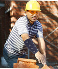 Built Tough Breathable Cut Resistant Wrist Sleeves And Forearm Guards For Heavy Duty Gardening Repair Or Mechanic Work Lightweight Abrasion Shield worn by a man handling bricks.