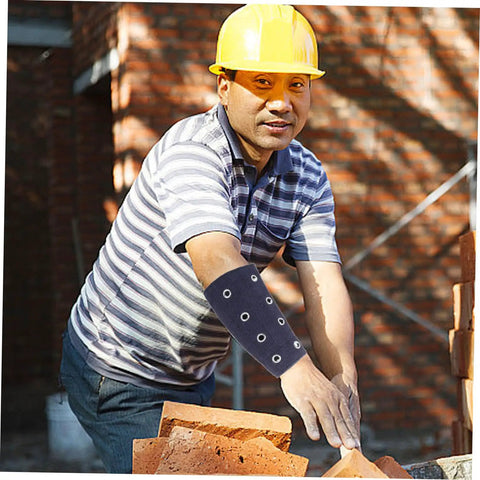 Built Tough Breathable Cut Resistant Wrist Sleeves And Forearm Guards For Heavy Duty Gardening Repair Or Mechanic Work Lightweight Abrasion Shield worn by a man handling bricks.
