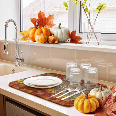 Thanksgiving Dish Drying Mat With Pumpkin Harvest Design For Kitchen Counter, Absorbent Microfiber Top Layer With Cushioned Core, 16 By 18 Inches on counter