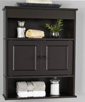 Wall-mounted black cabinet with ring pull handles, towels, and decor items displayed, featuring 10 Pcs Black Ring Pull Handles for Cabinets.