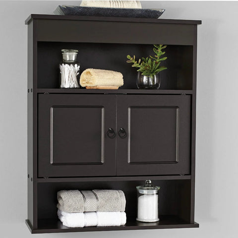 Wall-mounted black cabinet with ring pull handles, towels, and decor items displayed, featuring 10 Pcs Black Ring Pull Handles for Cabinets.