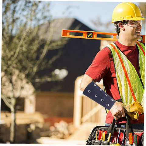 Slip On These Hella Tough Cut Resistant Arm Sleeves For Reliable Lightweight Wrist Guard Protection Built For Mechanic Jobs Welding And Outdoor Projects worn by a worker with tools.