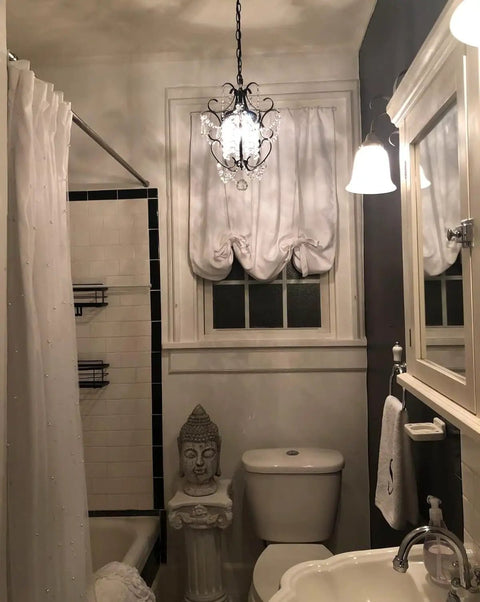 Bathroom with Chic Mini Bronze Chandelier 1 Light 11 Inch Crystal Ceiling Fixture, elegant home decor lighting above toilet.