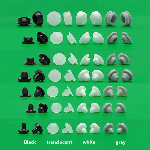Cool Silent T-Plug Silicone Rubber Stopper Kit For Door Gaskets And Hole Plugs, White Muffler Eyelets For Pipes, Sheets, Screws, And Machinery With NonStandard Custom Options To Block Noise And Collision Damage. White silicone plug set on green background, assorted sizes.